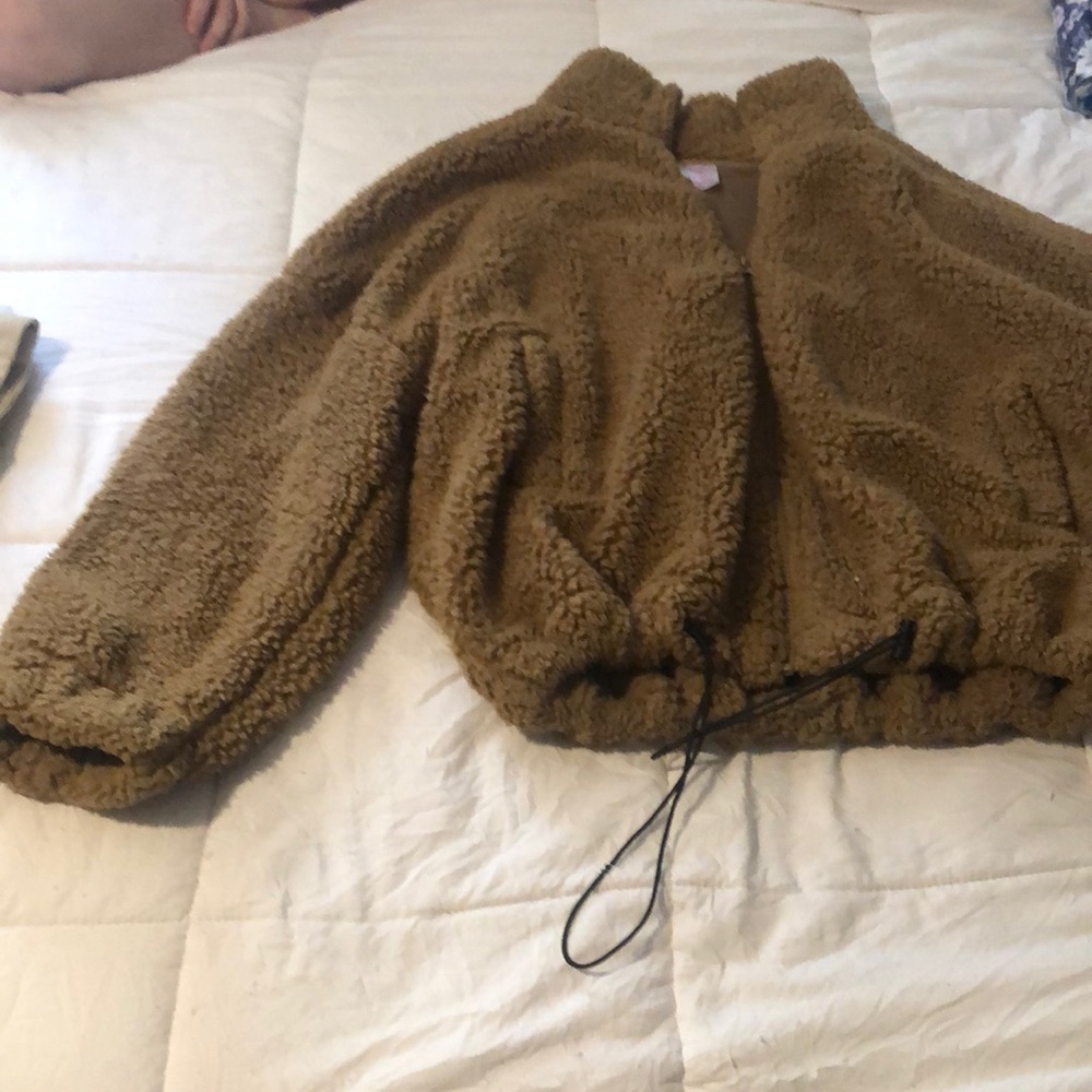 Fuzzy zip-up jacket.